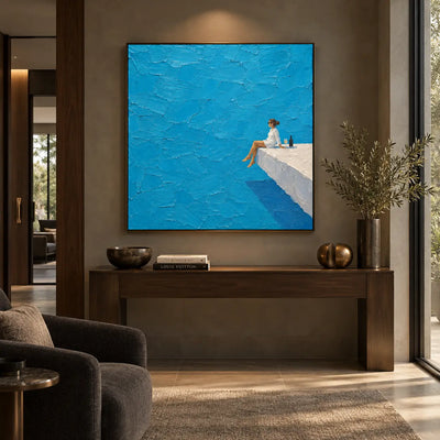 The Solitary Terrace Seat: above a wooden console between upholstered chairs and a gold-toned table