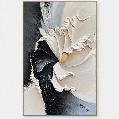 The Turning Point: Black and cream fan-like folds converge in a dramatic central whorl
