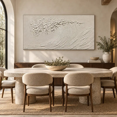 The Uncolored Breaker: above a dining sideboard behind an oval stone table