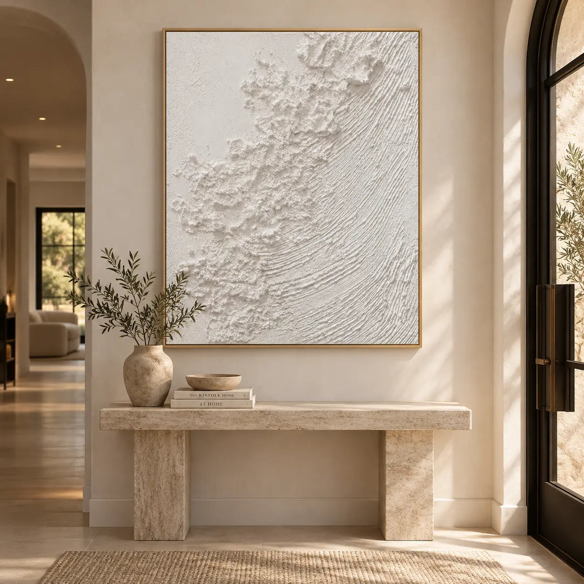 The White Current: above a stone console beside an arched black glass door