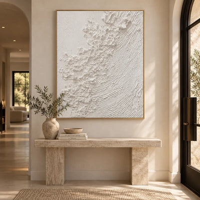 The White Current: above a stone console beside an arched black glass door