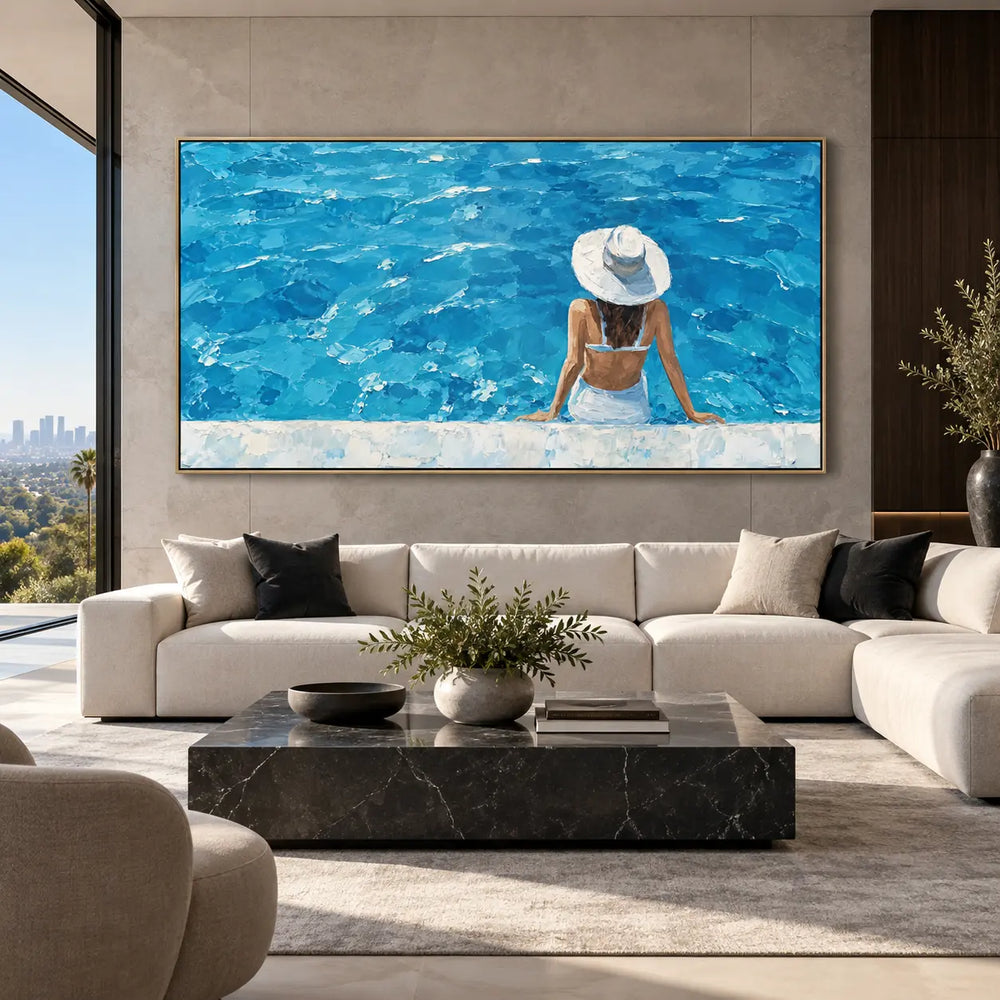 The Wide Blue Afternoon: above a cream sectional and square black marble table