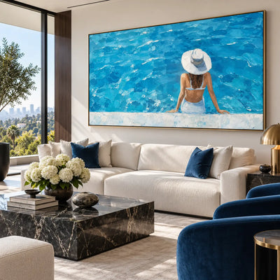 The Wide Blue Afternoon: above a white sofa with blue cushions beside a blue lounge chair