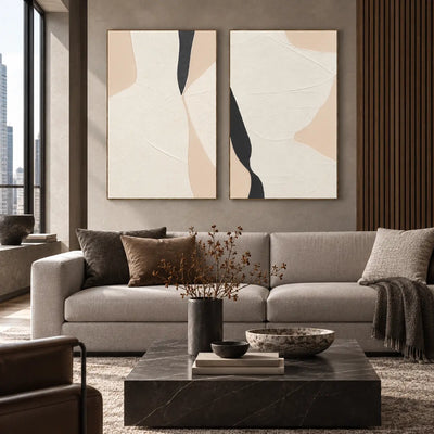 Two Openings in Cream: paired above a gray sofa with a black marble table and slatted wood wall