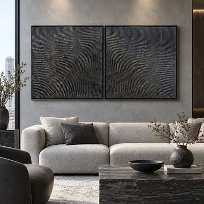 Two Rhythms in Charcoal: paired above a white sofa with a rectangular marble block table