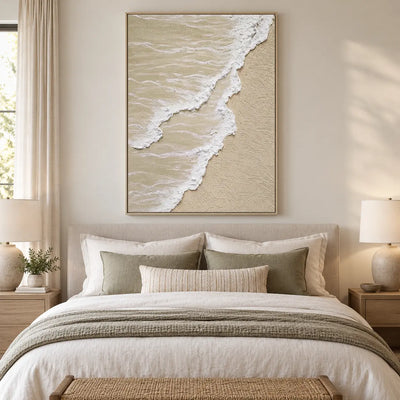 Two Tides on Pale Sand: above a white bed with sage pillows and paired ceramic lamps