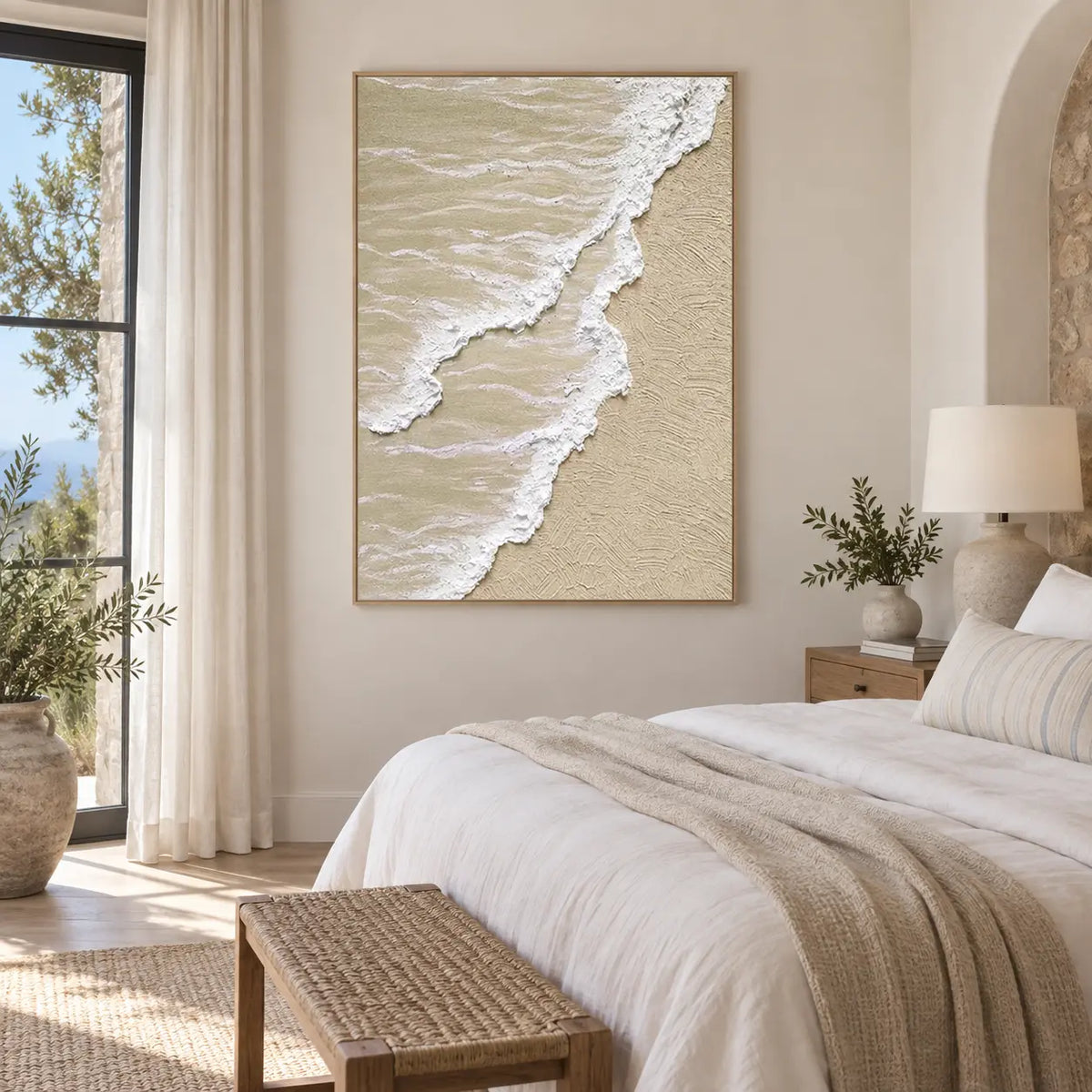 Two Tides on Pale Sand: beside a white bed and woven bench near a tall window