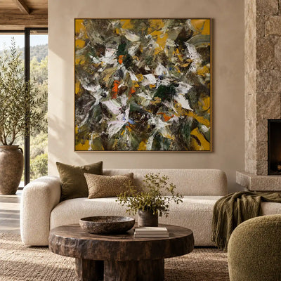 Under an Ochre Canopy: above an ivory sofa beside a stone fireplace