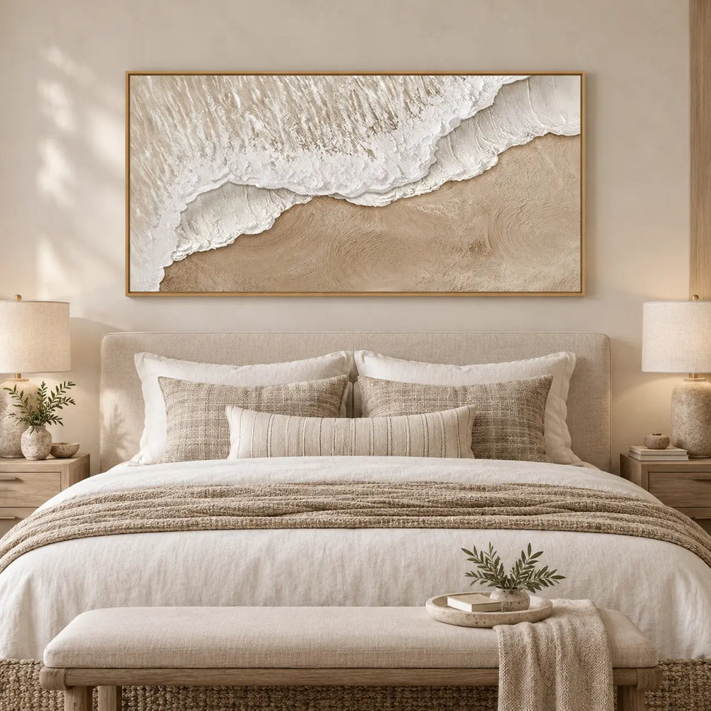 Where Foam Meets Sand: above a linen bed and pale wood bench with a leafy tray