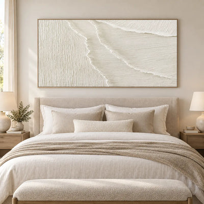 Where the Fine Lines Turn: above a linen bed with rectangular wood bedside tables and a cream bench