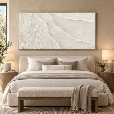 Where the Fine Lines Turn: above a rounded bed with cylindrical wood bedside tables