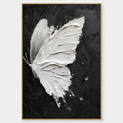 Wings Against Midnight: A large white butterfly spreads angular wings across a deep black ground