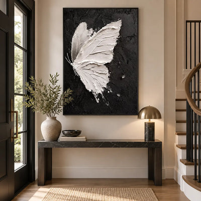 Wings Against Midnight: above a stone console beside a curved staircase